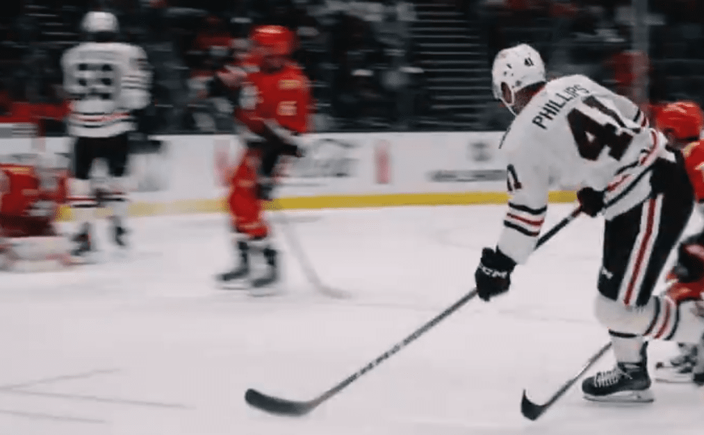 Isaak Philipps #41 of the Chicago Blackhawks fires a shot to give the Blackhawks the lead.